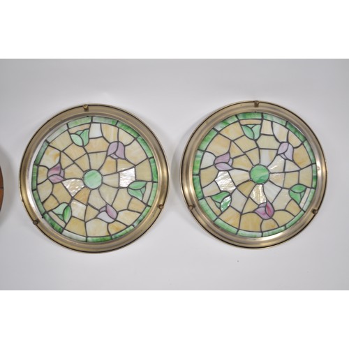 62 - A pair of Tiffany / Mackintosh style ceiling glass light shades together with one other glass upligh... 