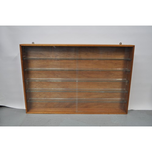 66 - A wall cabinet ideal for displaying model vehicles, with sliding front doors, x5 internal glass shel... 