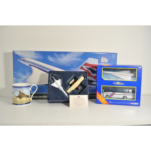 74 - Concorde related items consisting of boxed Concorde Set 1:144 scale plastic model kit, Corgi 1999 1:... 