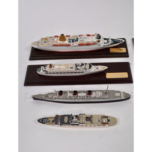 76 - A group of lead and metal cruise liners including some manufactured by  Skytrex ltd, models Canberra... 