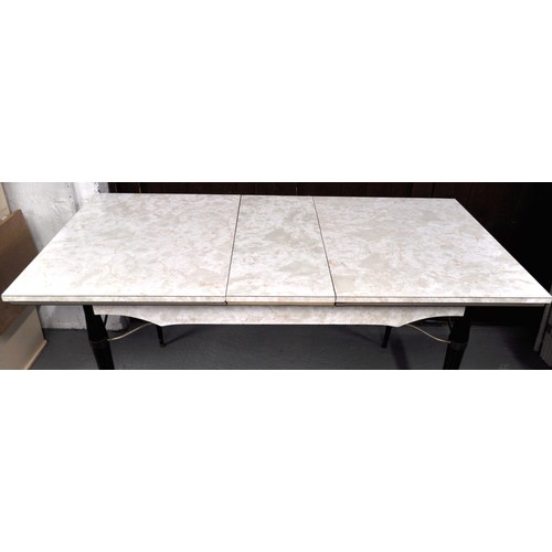 81 - Retro extendable dining table marble effect formica top with black tapered legs and metal trim, comp... 