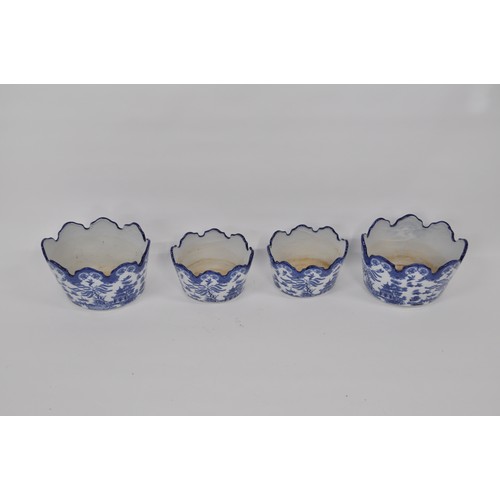 106 - Blue and white ceramic oval planters, Willow pattern style designs depicting pagoda landscape scenes... 