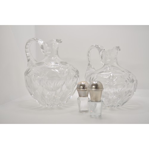 129 - Two crystal C B Z Holland  decanters, both with stoppers and one hallmarked 925 makers mark DJ