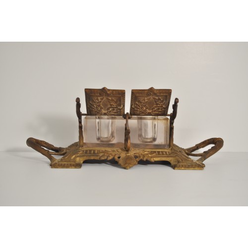 130 - Antique Townsend & Co double brass cut glass inkwell with decorative bow and swag design, AF