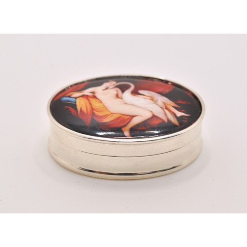 150 - Oval shaped pill box with enamel image of female form with swan, stamped Sterling to inside lid