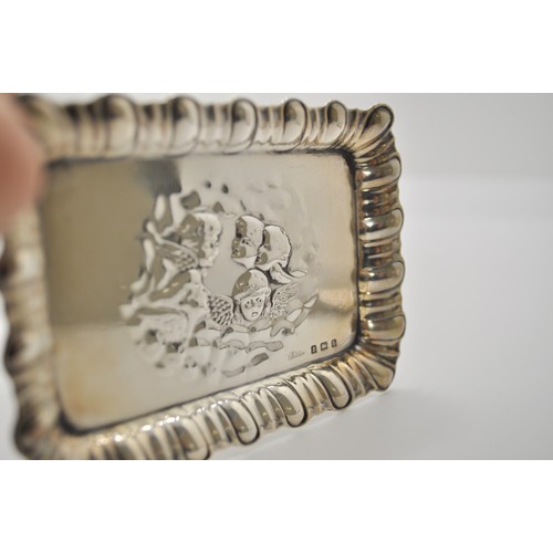 160 - A pair of antique silver trinket trays with cherub designs by A & J Zimmerman Ltd, hallmarked Birmin... 