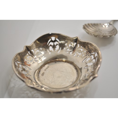 162 - Silver and Silver plate items consisting engraved twin handled decorative pot, napkin rings, match c... 