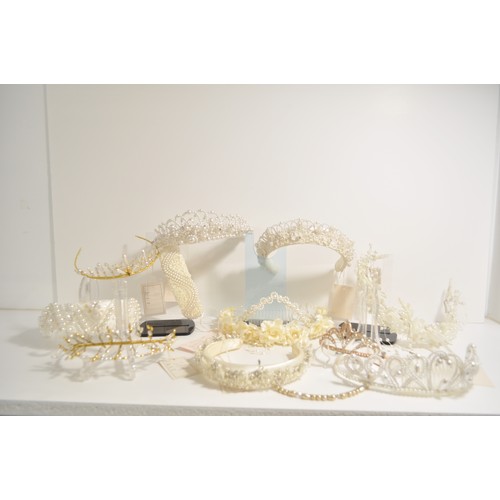 118 - Wedding shop stock of predominately pearl  tiaras in various designs and styles x12