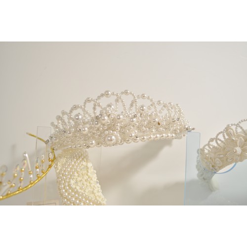 118 - Wedding shop stock of predominately pearl  tiaras in various designs and styles x12