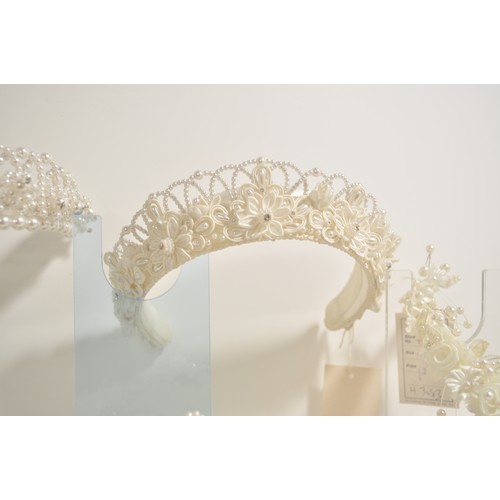 118 - Wedding shop stock of predominately pearl  tiaras in various designs and styles x12