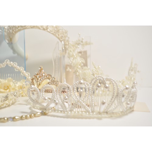 118 - Wedding shop stock of predominately pearl  tiaras in various designs and styles x12