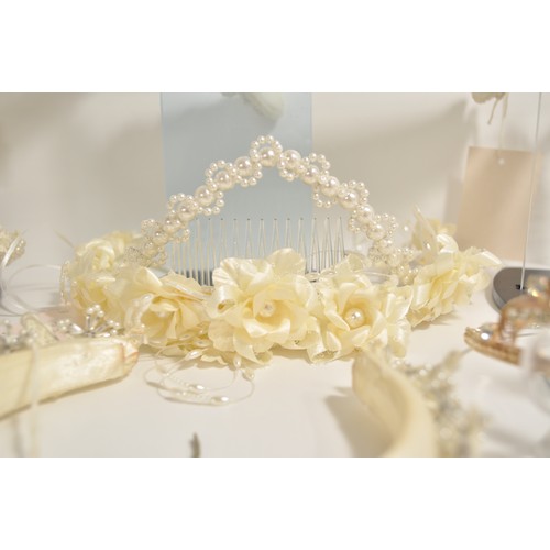 118 - Wedding shop stock of predominately pearl  tiaras in various designs and styles x12