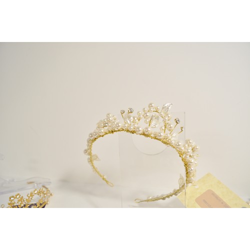 119 - Wedding shop liquidation stock of mixed tiaras in various designs and styles, all boxed x12