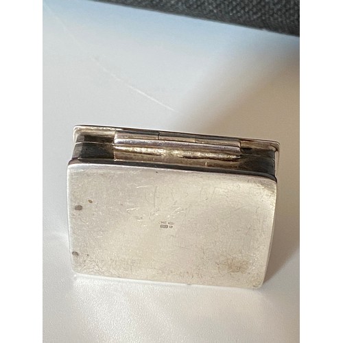 168 - A silver pill box, top panel with Huntsman hallmarked Birmingham stamped 925