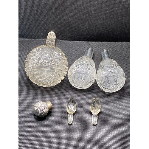 168E - Antique perfume bottles consisting pair of faceted tops with silver collars hallmarked Birmingham,  ... 