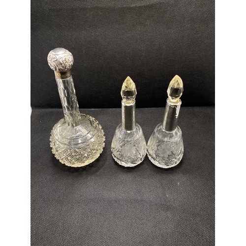 168E - Antique perfume bottles consisting pair of faceted tops with silver collars hallmarked Birmingham,  ... 