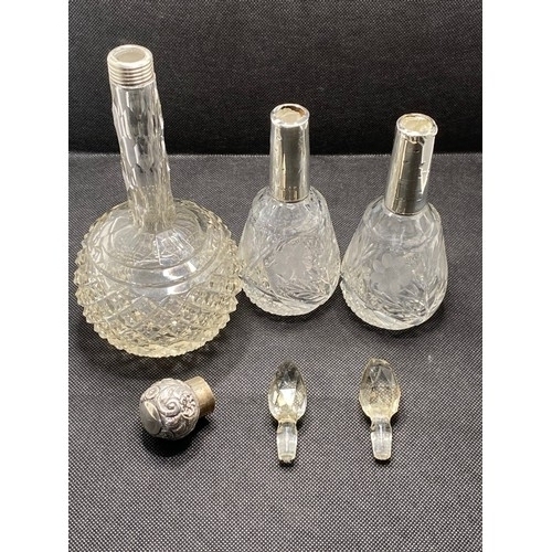 168E - Antique perfume bottles consisting pair of faceted tops with silver collars hallmarked Birmingham,  ... 