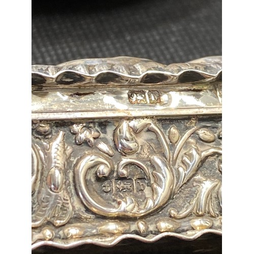 168F - Antique repousse silver backed clothes brush hallmarked Chester 1901 together with rectangular trink... 