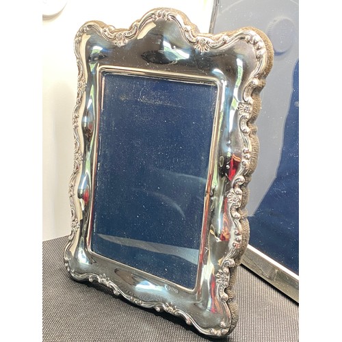 168G - x3 Silver mounted photoframes,  hallmarked Sheffield  1990 and 2002. Largest size frame measures L28... 