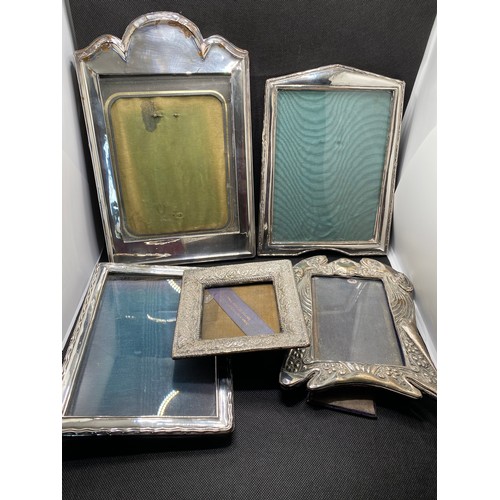 168H - A group of Silver mounted photo frames various designs and size, All marked Silver, predominately ha... 