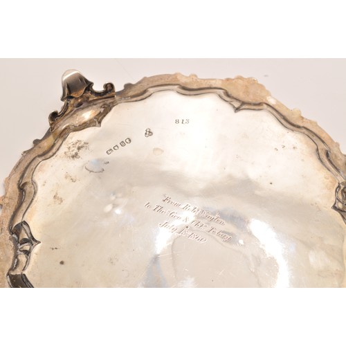 223 - Victorian silver card tray with flower foliate engraved detailing on raised feet, diameter 19cm, hal... 