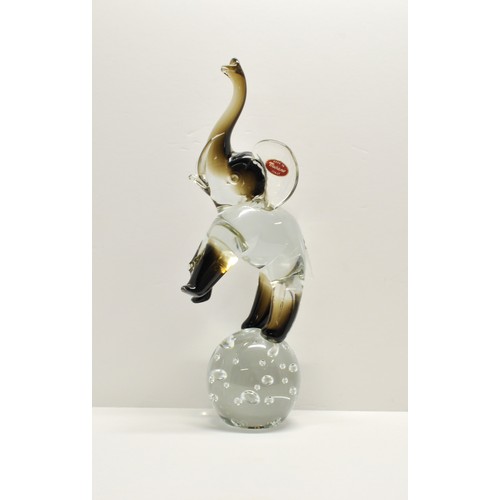 366 - Rare Murano glass figure of a large circus style elephant on a ball, with label, 36cms tall x 14cms ... 