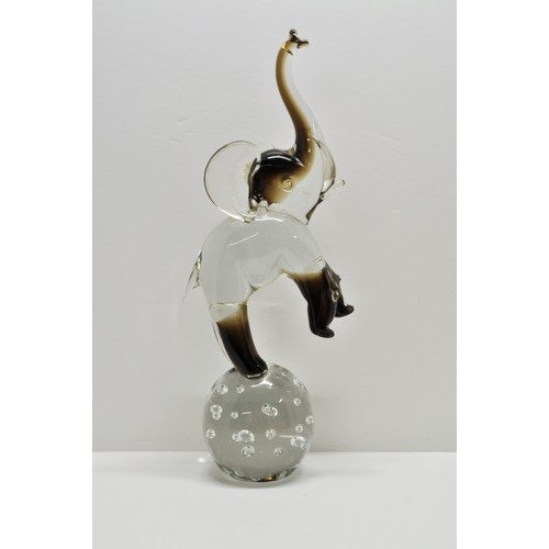 366 - Rare Murano glass figure of a large circus style elephant on a ball, with label, 36cms tall x 14cms ... 