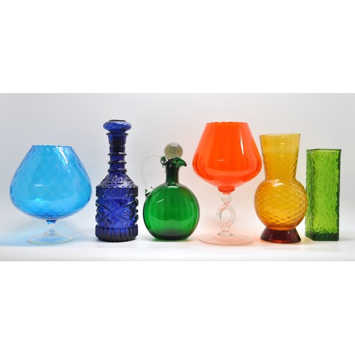 378 - A shelf full of retro mixed-coloured glassware, including decanters, vases etc. x6 items in total