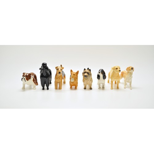 382 - A group of Beswick dogs to include Poodle, Spaniel etc. x8 in total