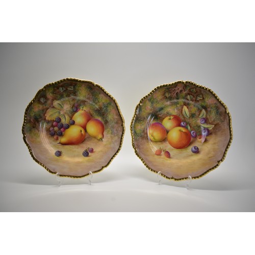 387 - x2 Royal Worcester fruit painted cabinet plates with gilt gadrooned rim, both are signed H Ayrton,(H...