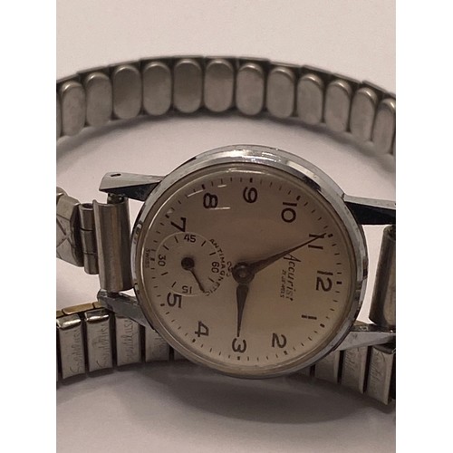 391 - A group of vintage watches to include a ladies Rolex stamped FC4791876 to back, a military-style Win... 