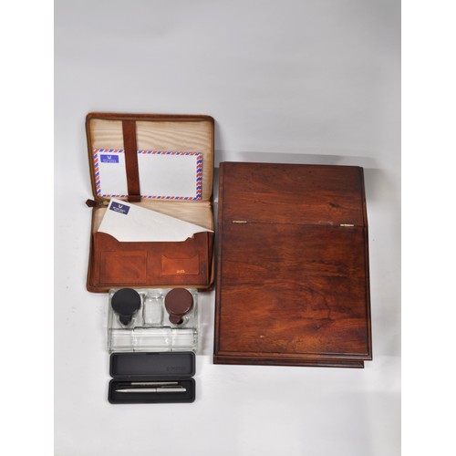 7 - Mahogany writing slope together with glass inkwells, a Parker pencil and a leather writing case