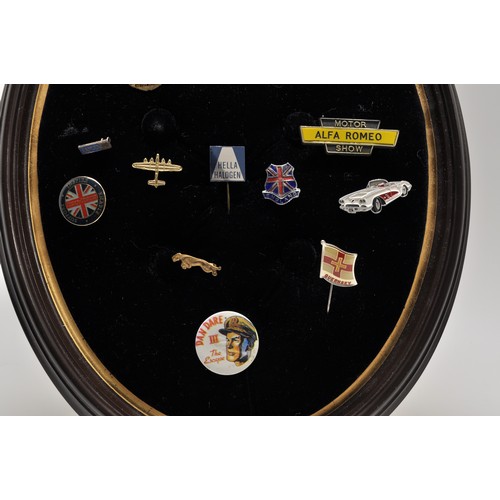 11 - An assortment of motoring related and other pin badges/lapel sticks including Jaguar, Aston Martin, ... 