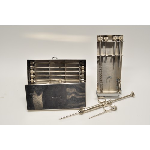 17 - Welwyn Tool Company box containing stainless steel syringe and other items