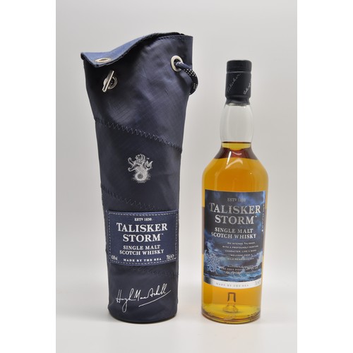 91 - Talisker Storm 70cl bottle of single malt scotch whisky in presentation pouch, together with 70cl bo... 