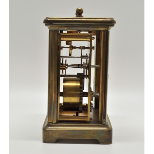 113 - Antique travelling carriage clock in case, bevelled glass with white dial reads Drew & Co 56 & 157 L... 