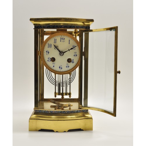 120 - Antique brass enamel trim mantle clock with  white enamel dial, bow-fronted bevelled glass panel wit... 