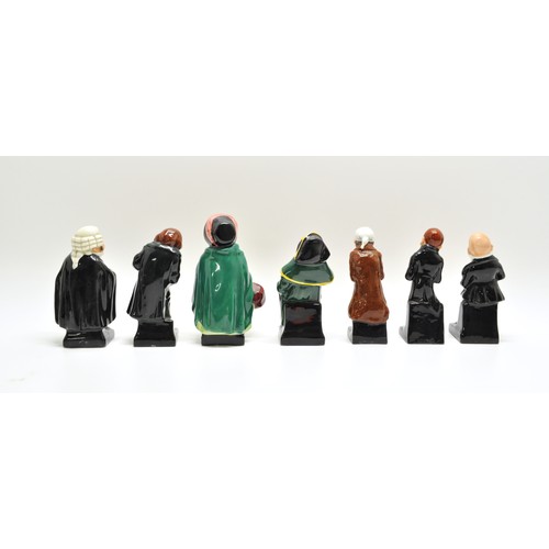 141 - A group of Royal Doulton miniature figures;   Scrooge, Fagin, Micawber, Buzfuz and Uriah Heep, Bumbl... 