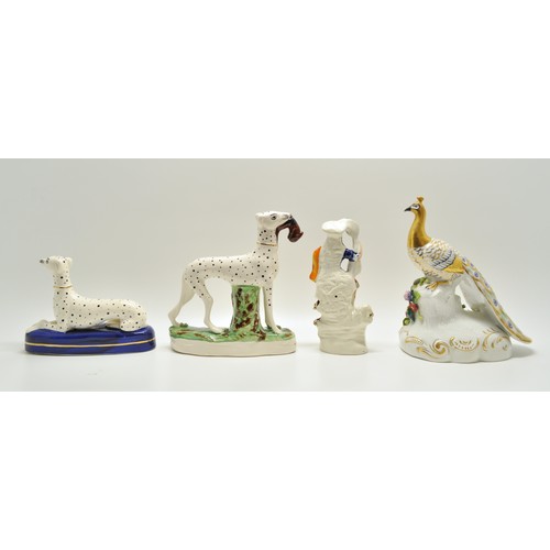 153 - Group of Staffordshire/Staffordshire style and other porcelain figures including dogs, Peacock and S... 