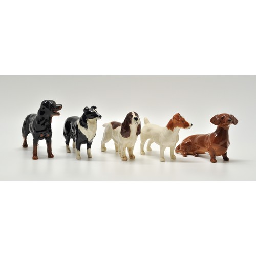 154 - Group of Beswick dogs including Spaniel, Dachshund, Jack Russell, etc, x5 items