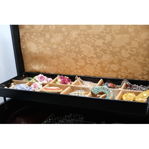 87A - Jewellery box with contents - consisting of watches, brooches, bracelets, necklaces, earrings some o... 