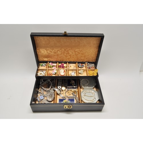 87A - Jewellery box with contents - consisting of watches, brooches, bracelets, necklaces, earrings some o... 