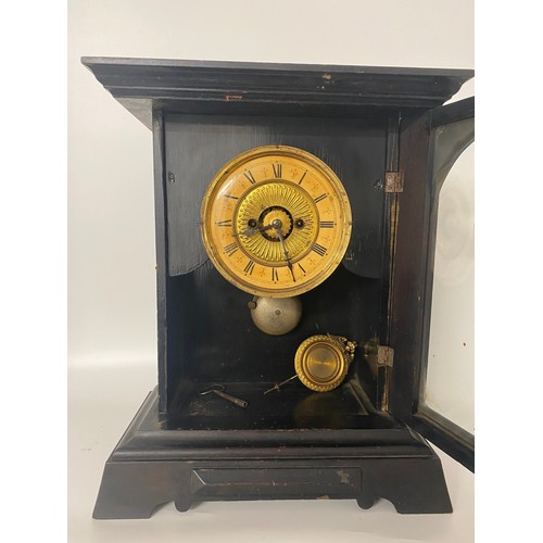 124 - Antique Wall clock by maker Hamburg American Corporation (HAC), with pendulum and key, untested