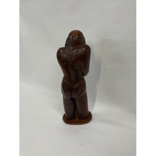 2 - Unusual contemporary solid wood sculpture of male nude form in bowed holding head pose, unsigned, ap... 