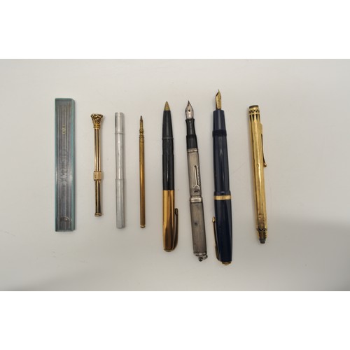 16 - A collection  of pens, to include  a blue parker fountain pen with 14k gold nib,  silver fountain pe... 