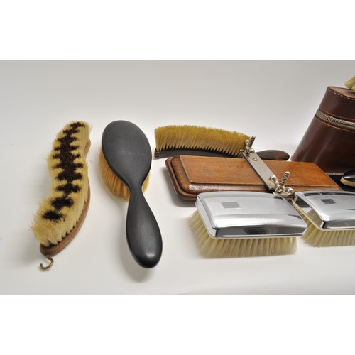 18 - Gentlemen's travelling case, various brushes, tie press and other items