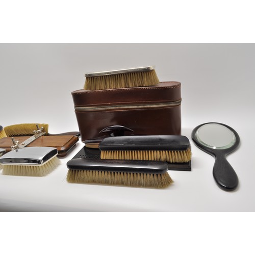 18 - Gentlemen's travelling case, various brushes, tie press and other items