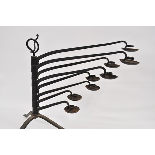 22 - Antique large iron candle stand with 8 moveable branches in arts & craft style, max height approx 56... 