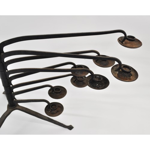 22 - Antique large iron candle stand with 8 moveable branches in arts & craft style, max height approx 56... 