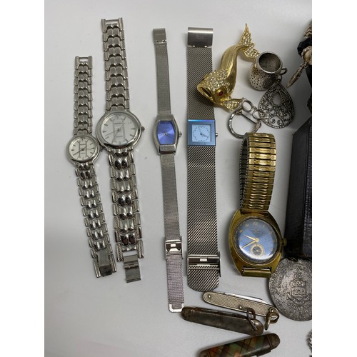 26 - Mixed costume Jewellery to include rings, brooches, badges, necklaces, vintage Talis wristwatch and ... 